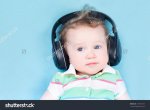 stock-photo-cute-little-baby-with-huge-earphones-137367167.jpg